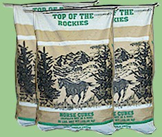 Bags of Top Of The Rockies alfalfa horse cubes.