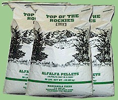 Bags of Top Of The Rockies alfalfa pellets.